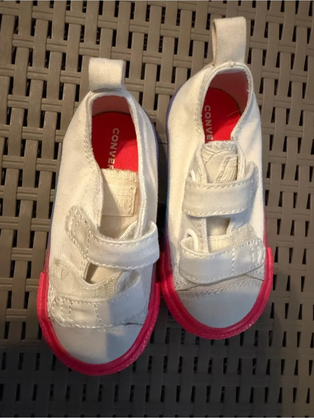 Converse Kids White Canvas Slip-On Sneakers with Pink Outsole